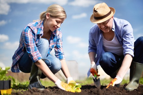 Operative using protective equipment during landscaping