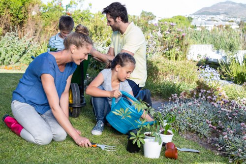 Electric van from gardening service making a low-emission collection